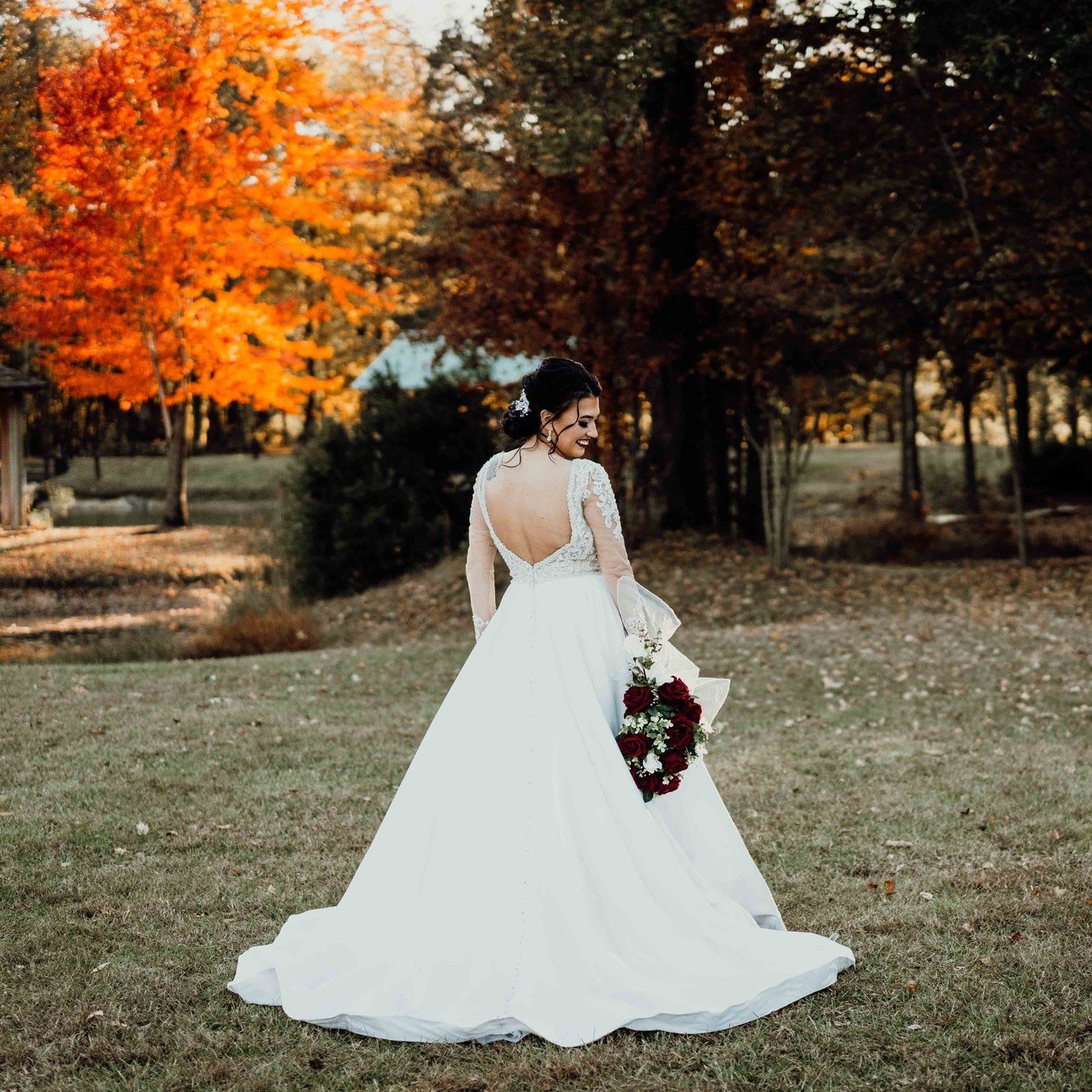 Bride-Backward-Glance-With-Orange-Maple-Tree.jpg