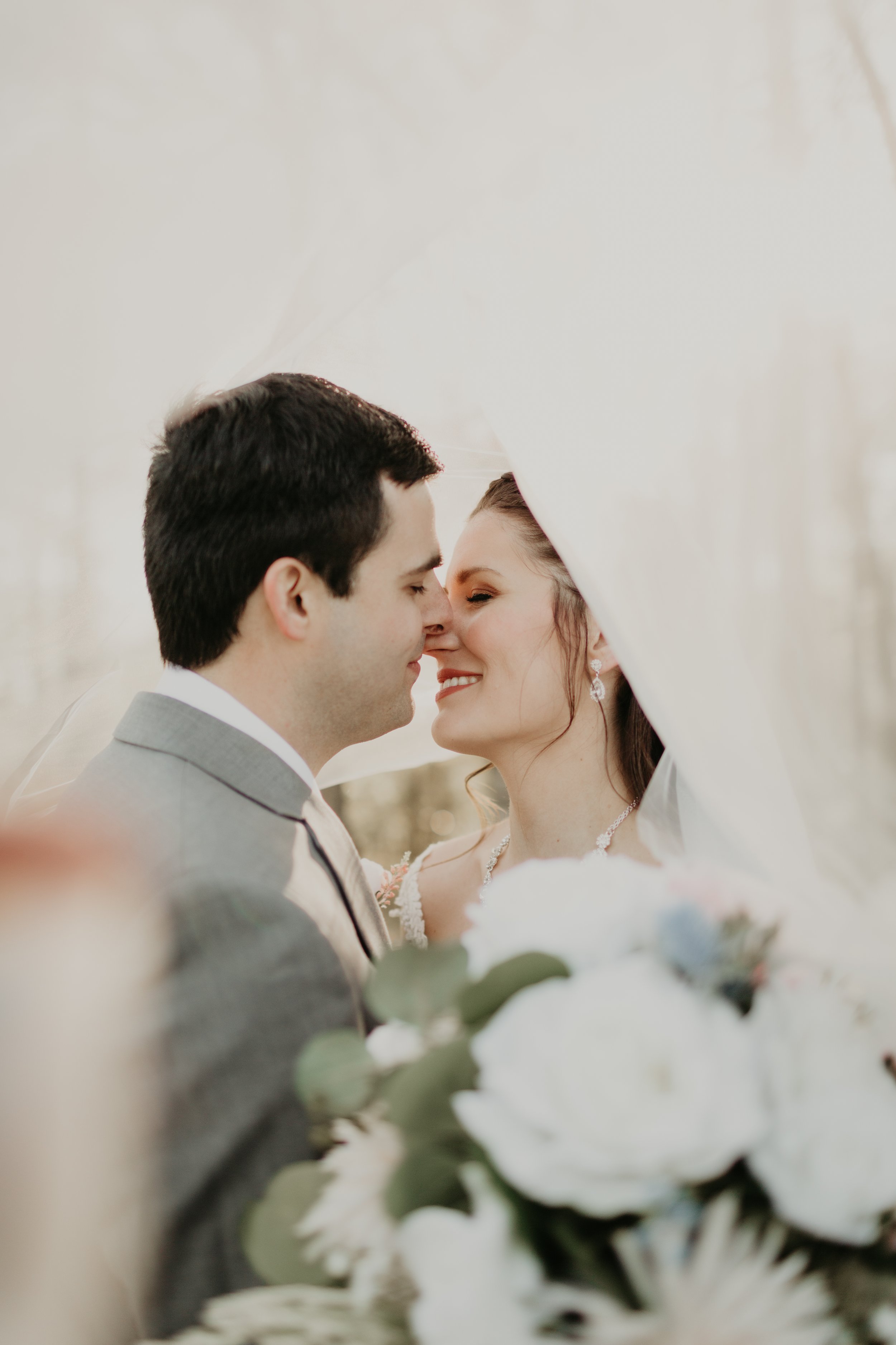 Wedding-Couple-Under-Veil.JPG