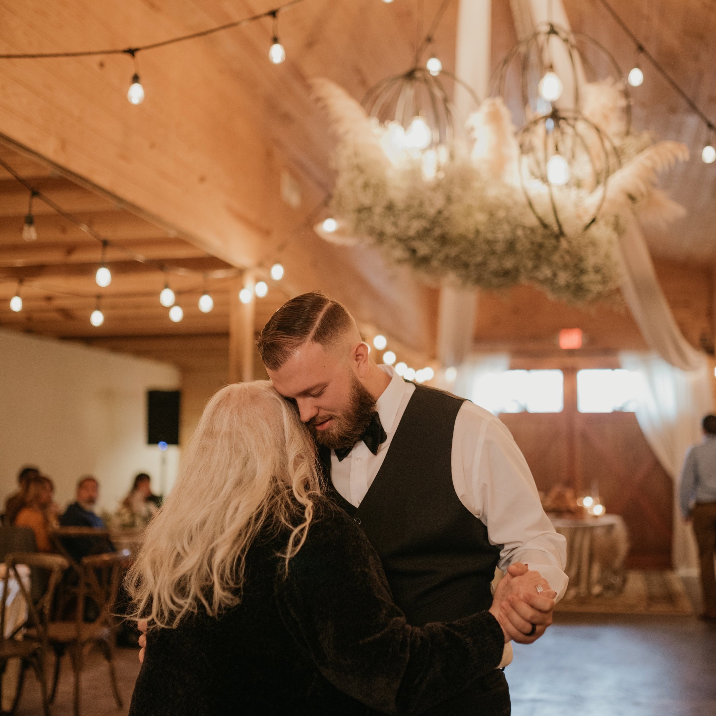  groom dancing with his mom at barn wedding venue in Fayetteville NC 