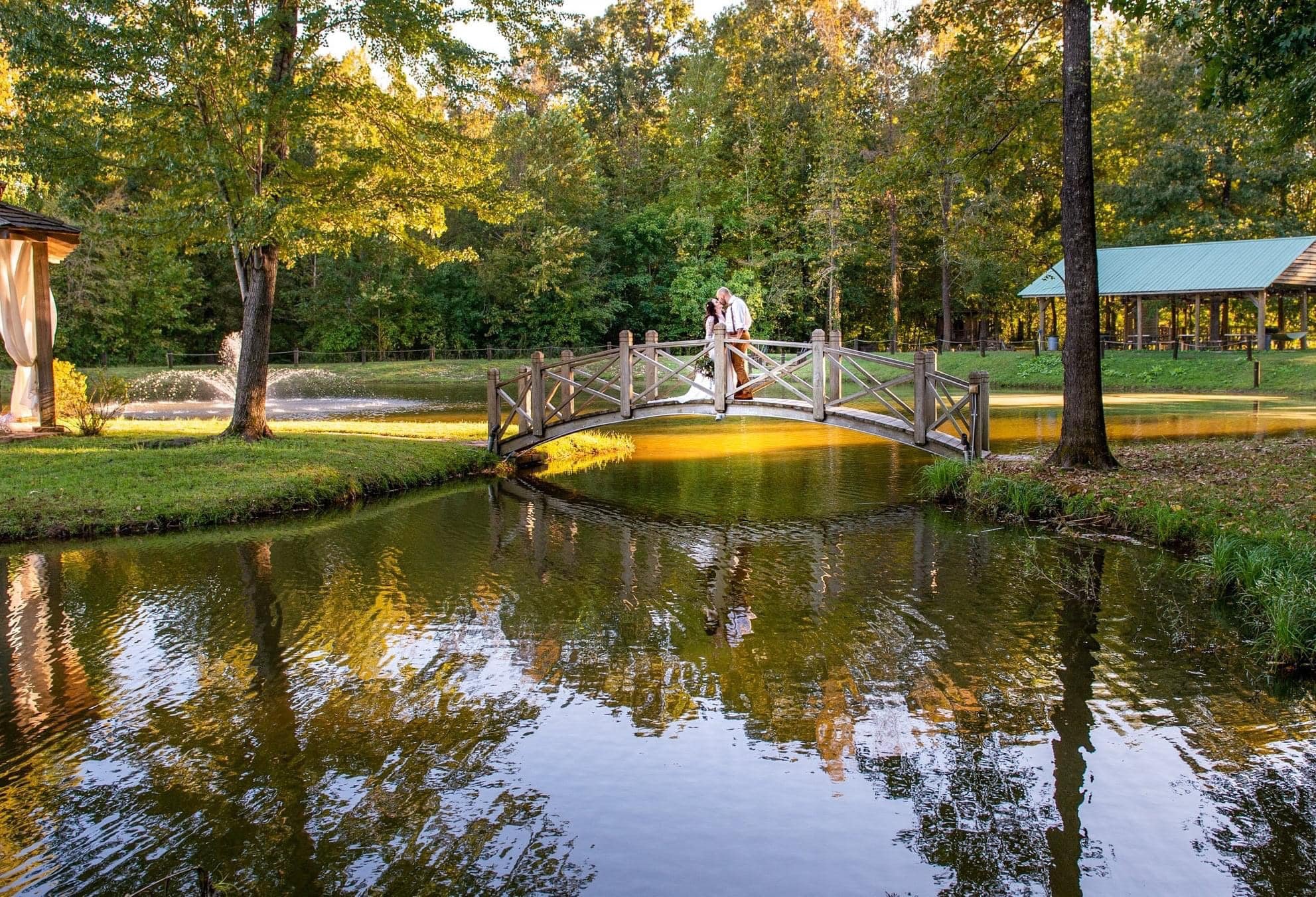 Couple-Kissing-on-Bridge-Rustic.jpeg