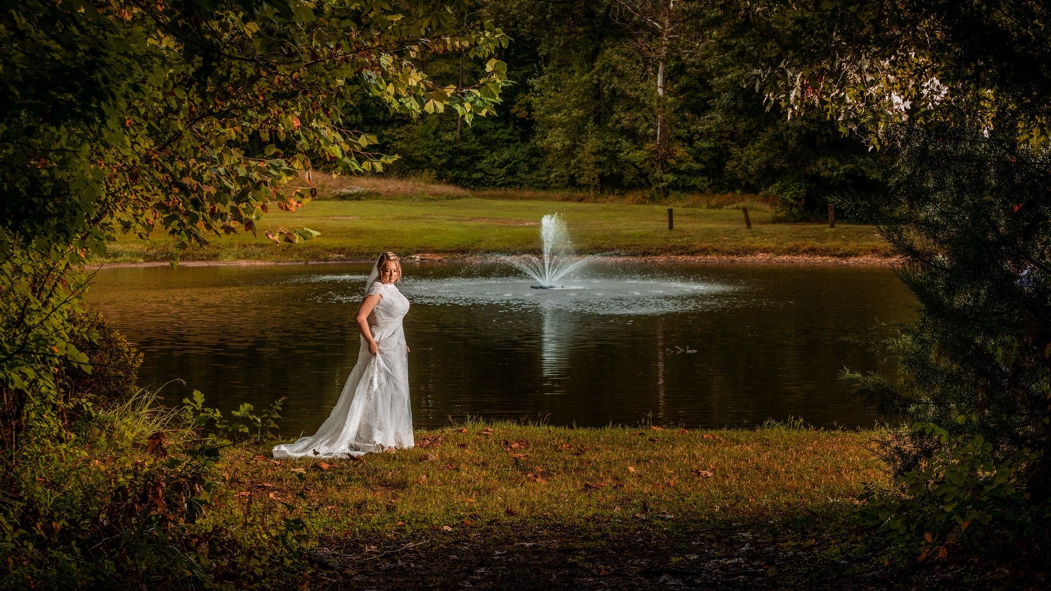 Nature-Surrounds-Fall-Bride-With-Pond-Fountain 2.jpg