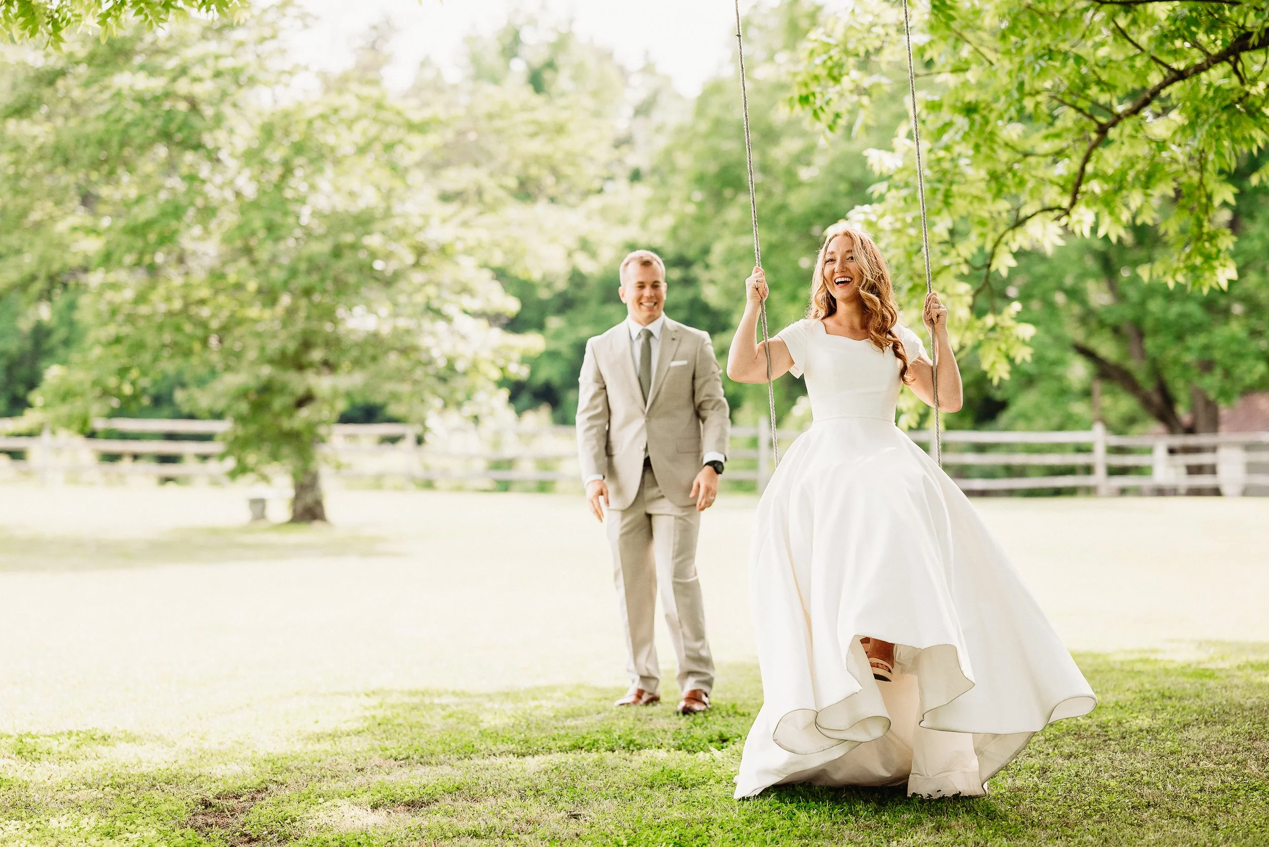 The-Catlett-Farm-Groom-Pushes-Bride-Tree-Swing-.jpg