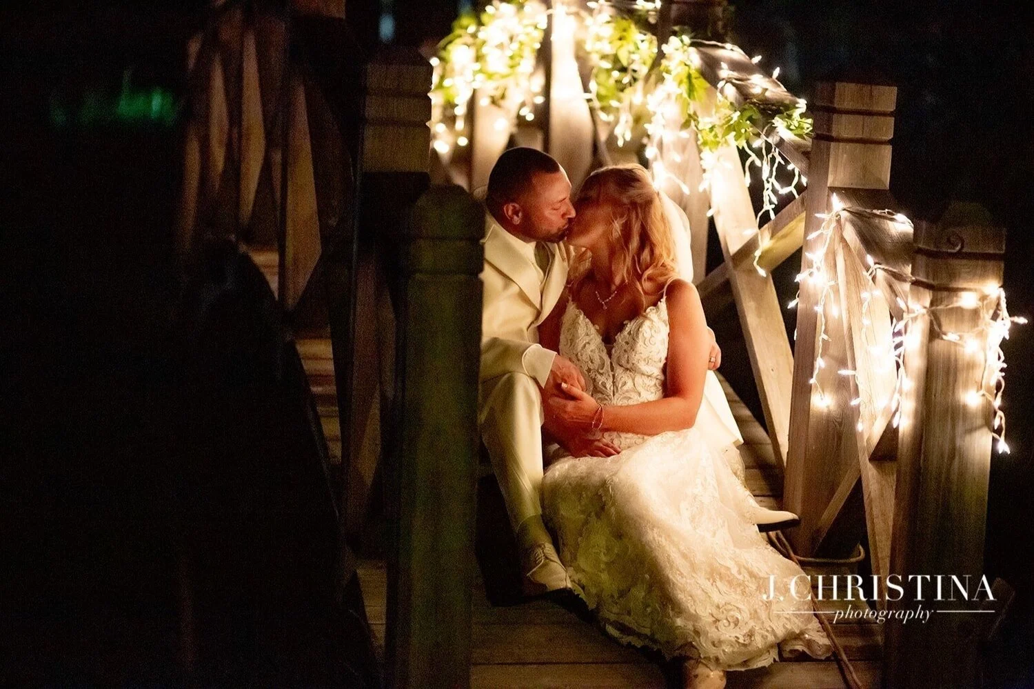 The-Catlett-Farm-Bridge-Night-Wedding-Kiss-.jpg