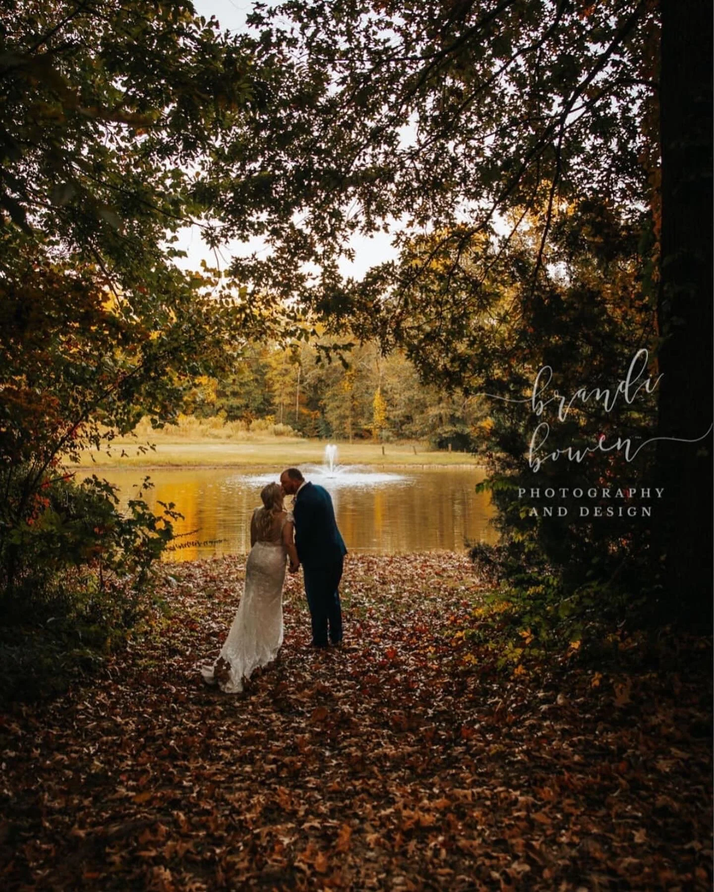 Natural-Tree-Arch-Golden-Pond-Wedding-Kiss-.jpeg
