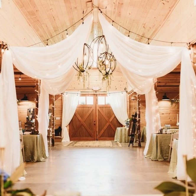 Full-X doors inside draped venue at The Catlett Farm