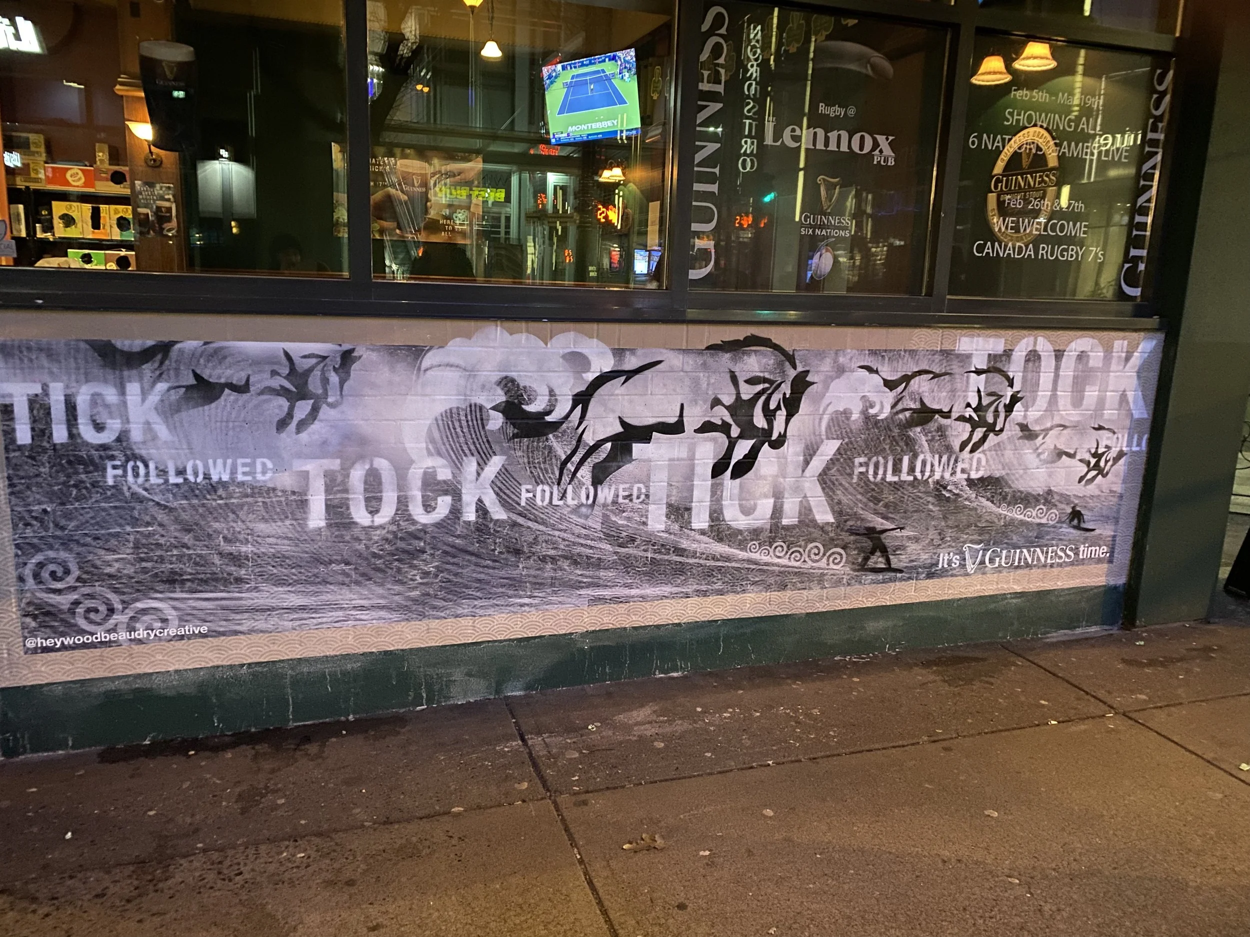 Completed Guinness mural on the exterior of the Lennox Pub