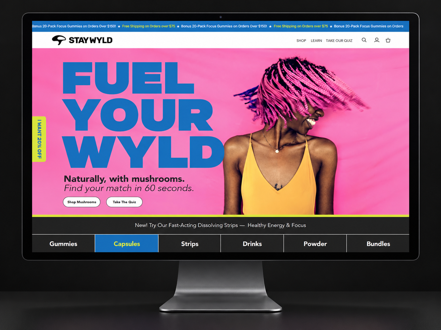 Stay Wyld website displayed on a graphite desktop monitor