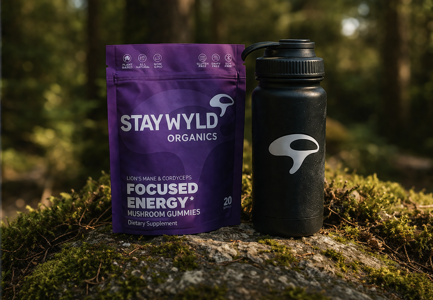 Stay Wyld purple mushroom gummy packaging and branded bottle outdoors