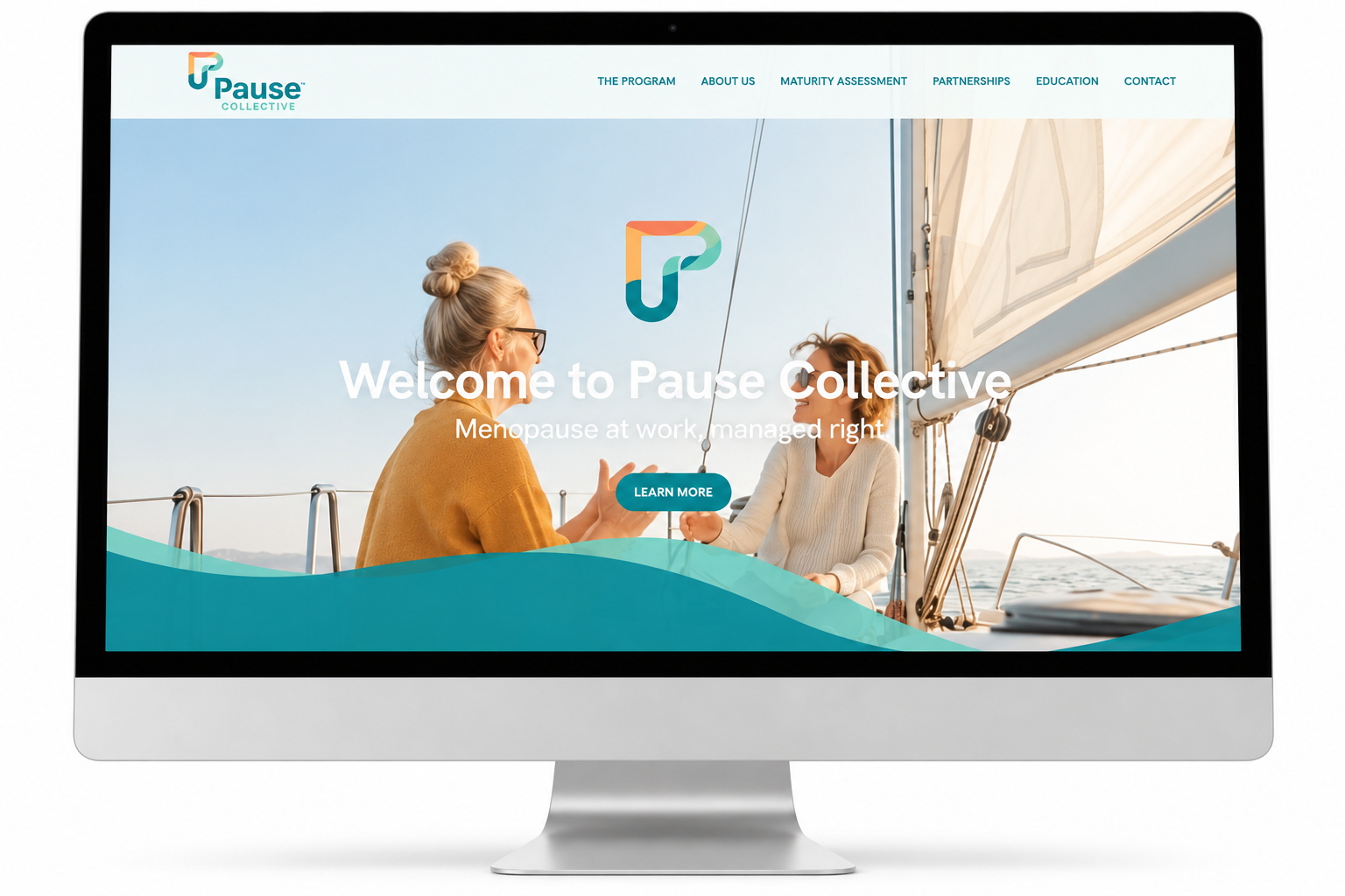 Pause Collective website homepage displayed on a desktop monitor