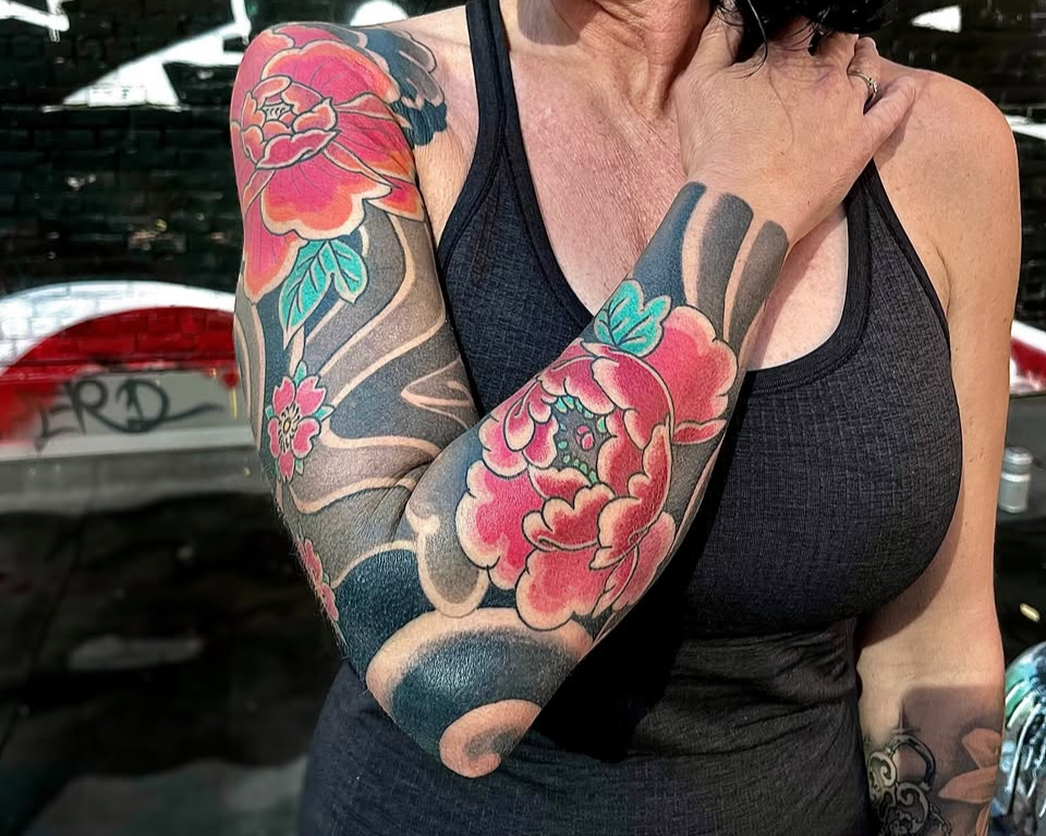 Black & grey realism tiger tattoo with bold contrast and smooth shading.