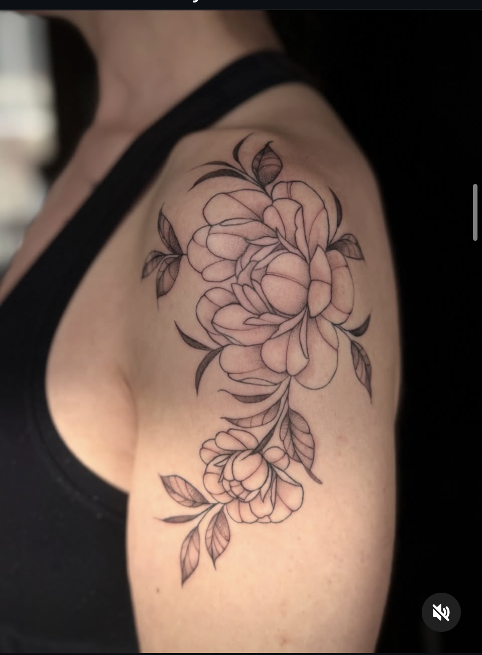 Fine line floral tattoo with delicate detail and precision by Melissa.