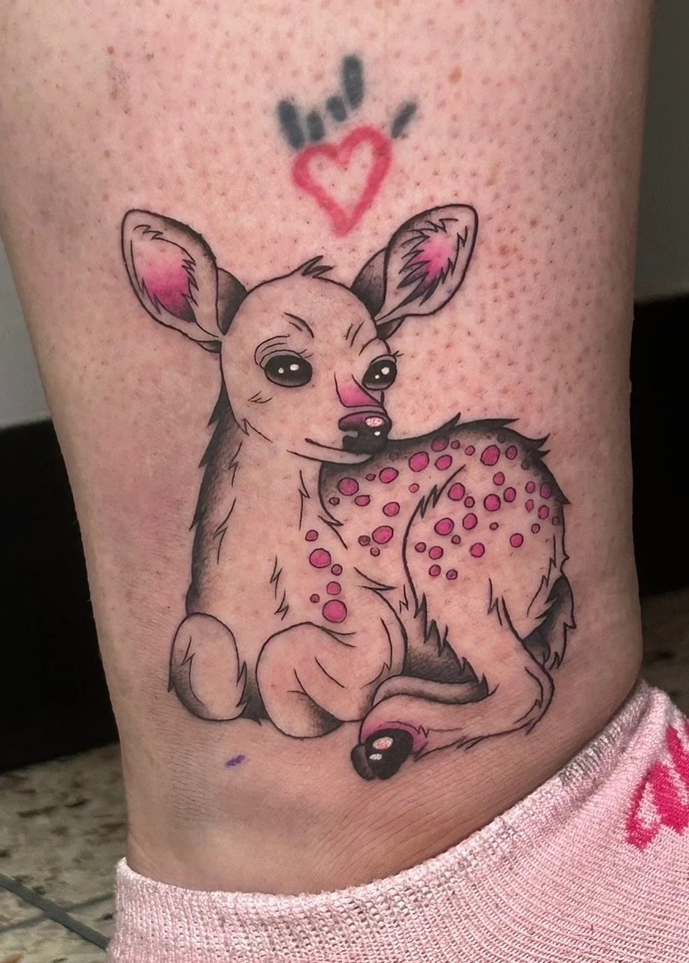 Baby deer tattoo by Hailey at Motor City Tattoo Studio in Oshawa featuring clean line work, soft shading, and fine detail.