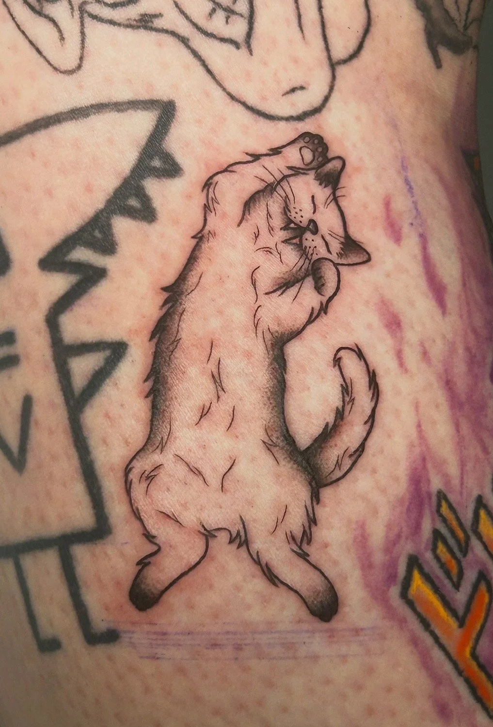 Custom mouse tattoo by Hailey, junior tattoo artist at Motor City Tattoo Studio in Durham Region, featuring clean line work and fine detai