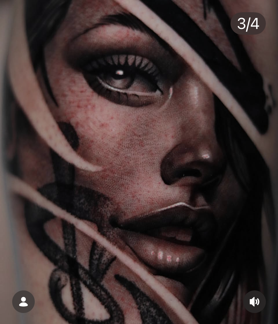 Black and grey realism portrait showcasing intricate detail, dramatic shading, and captivating expression.
