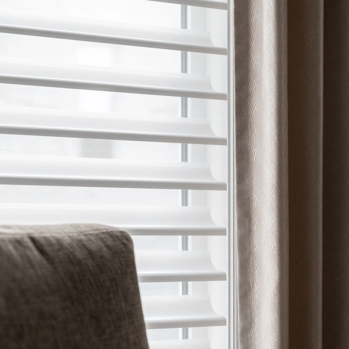 custom blinds and drapery by Jaimie Mehler of Savori Spaces a greater Edmonton and area interior design firm