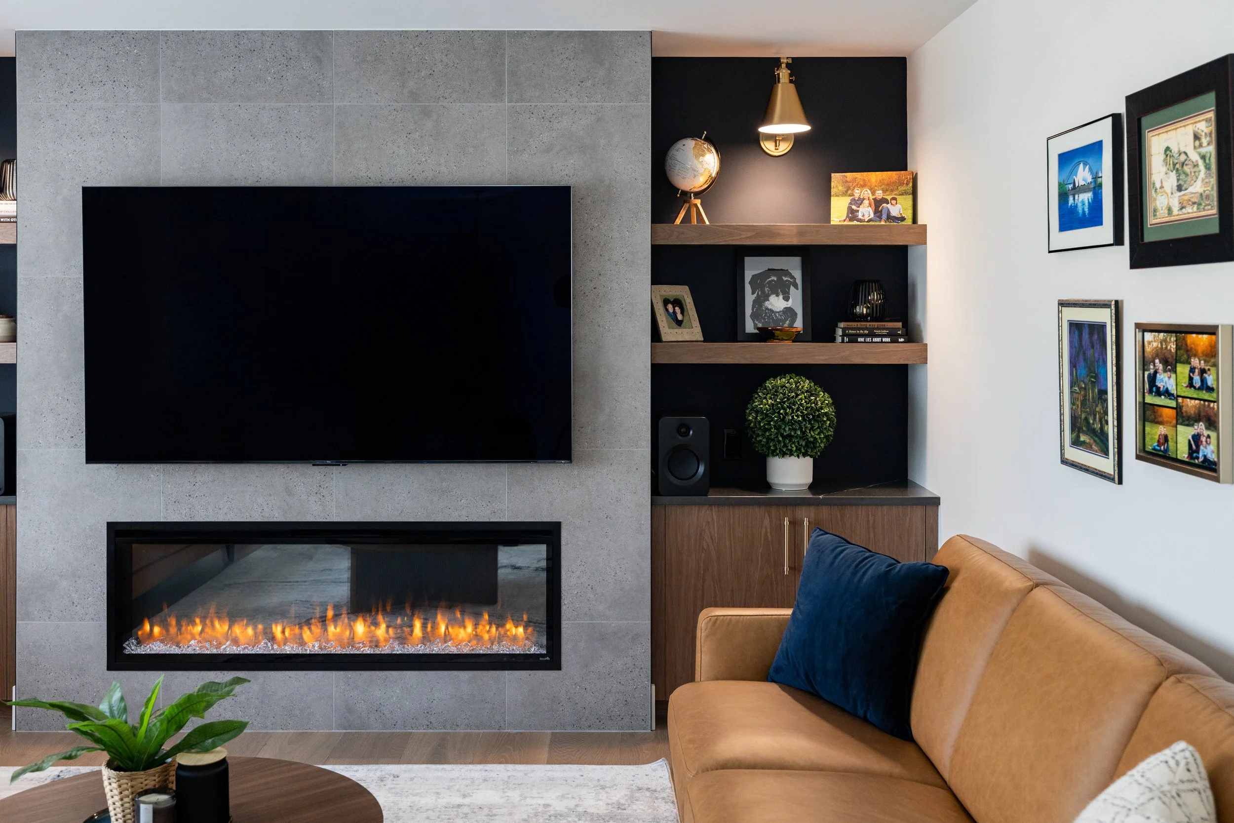Custom Fireplace with TV Above and built in cabinets and shelves.