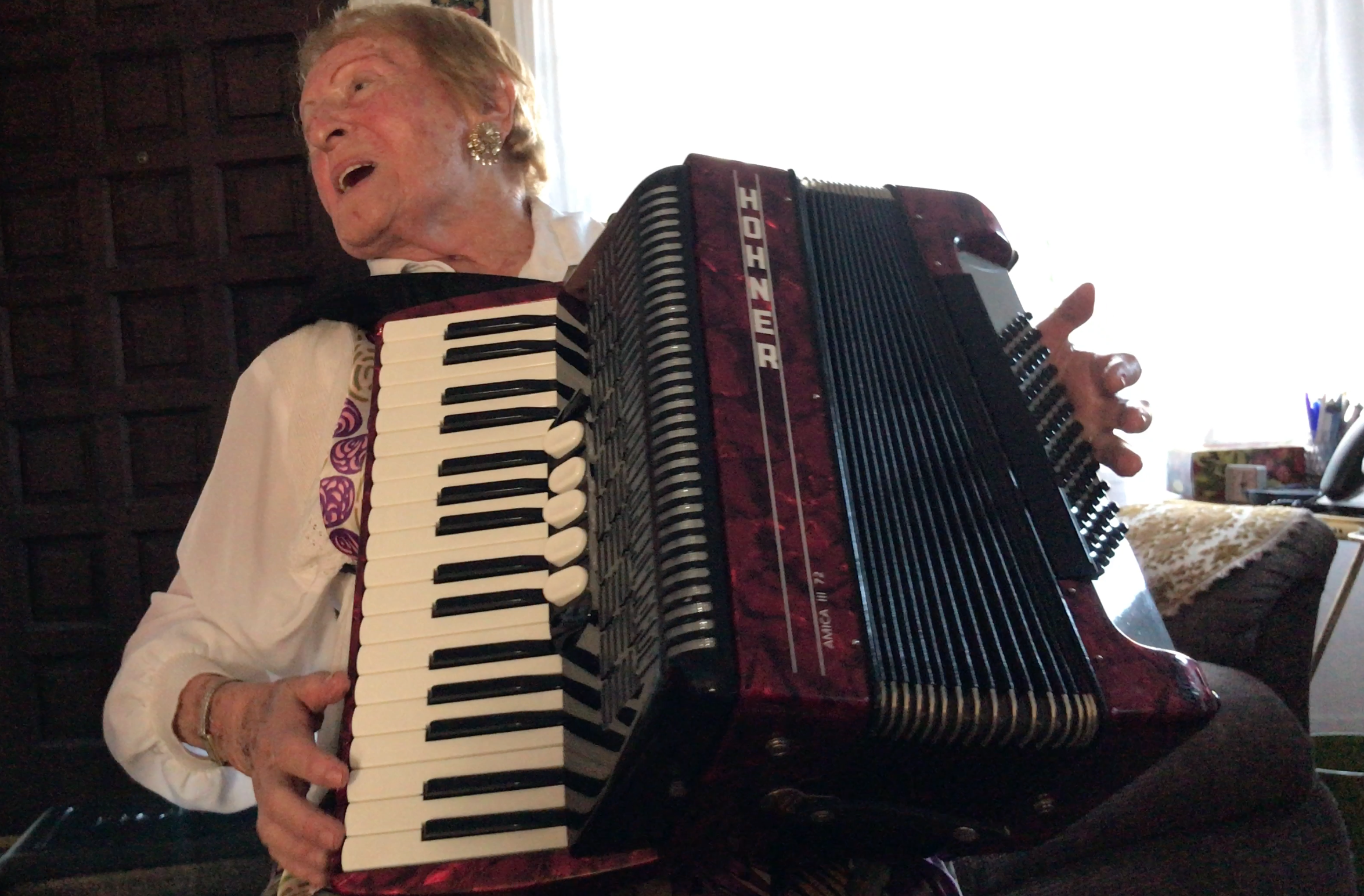Risa at the accordian 2017-09-18 21.34.30.png
