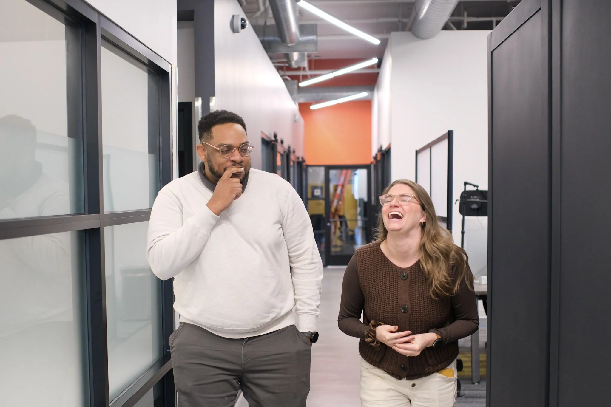 Offices people laughing in hallway (frisco).jpg