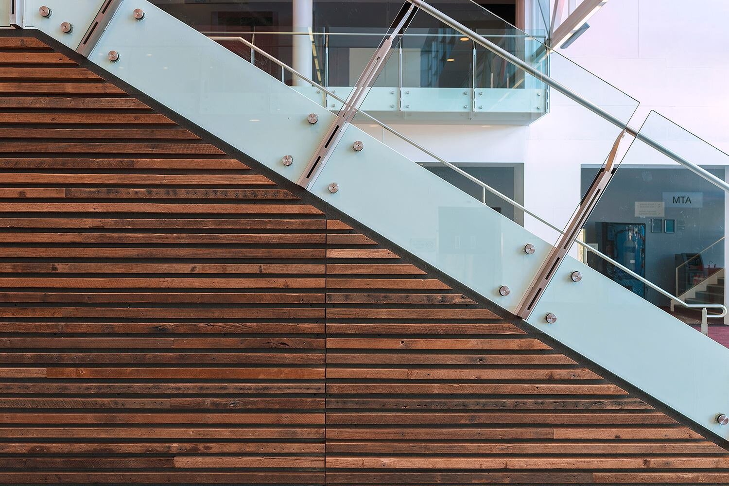 Recycled timber cladding on the staircare of National Convention Centre
