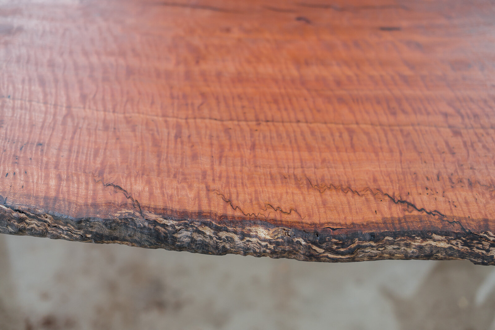 Close-up of a finished piece of one-off timber slab for a table