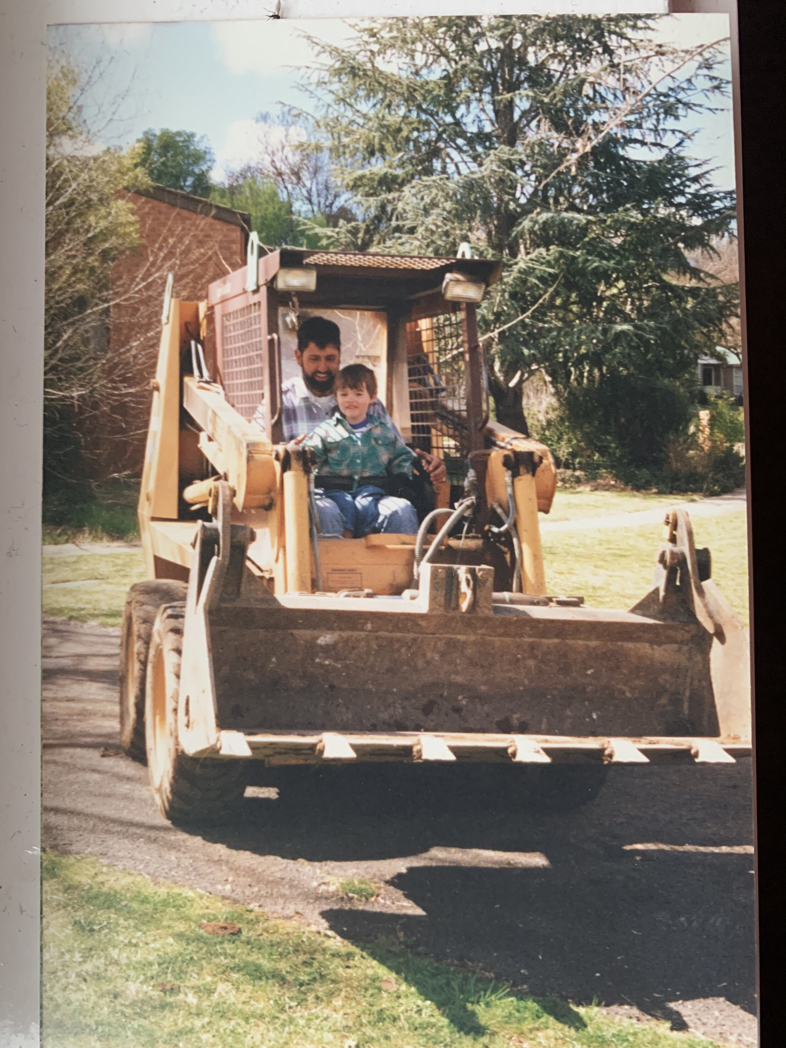  Lachlan aged 2, ‘helping’ on the bobcat that was used on his grandparents' house renovation. 