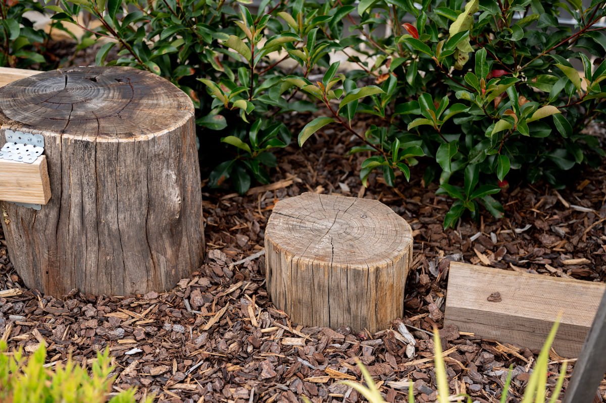 Close-up of a round recycled timber post