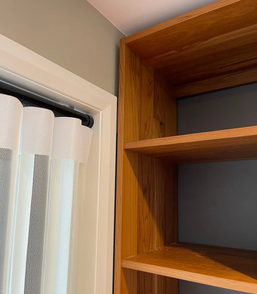 3-teak bookshelf installation.jpg