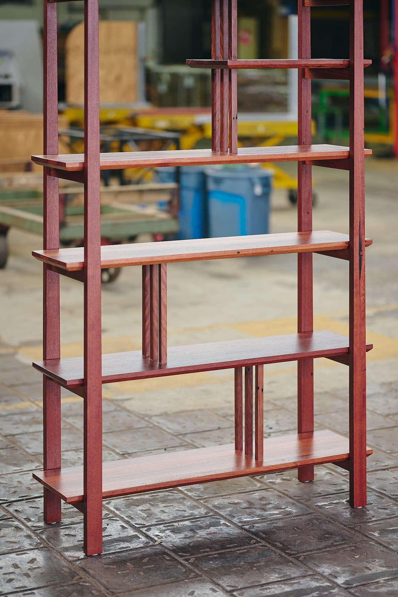 Japanese-style ornamental shelving unit in mixed reds