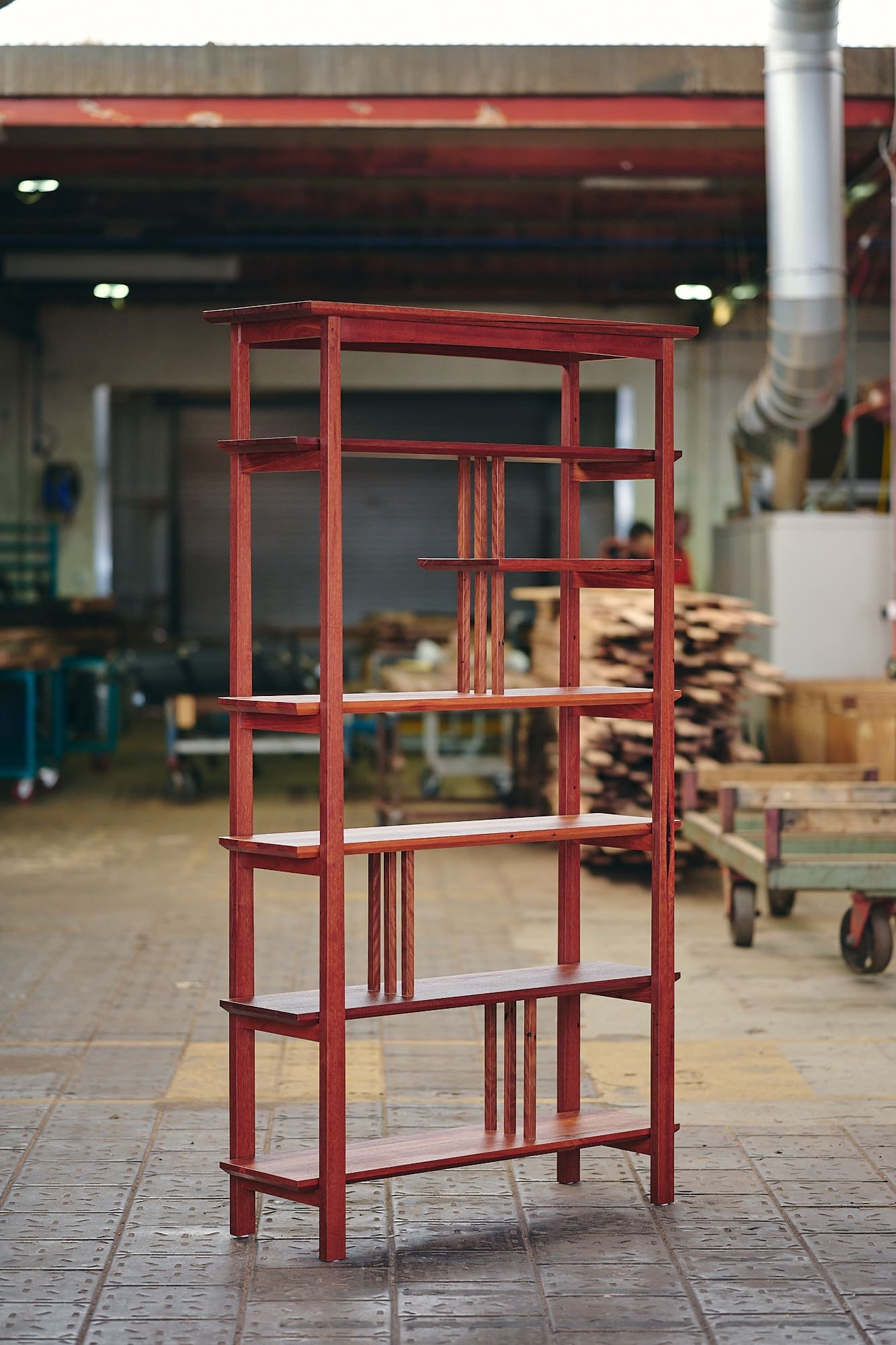 Japanese-style ornamental shelving unit in mixed reds