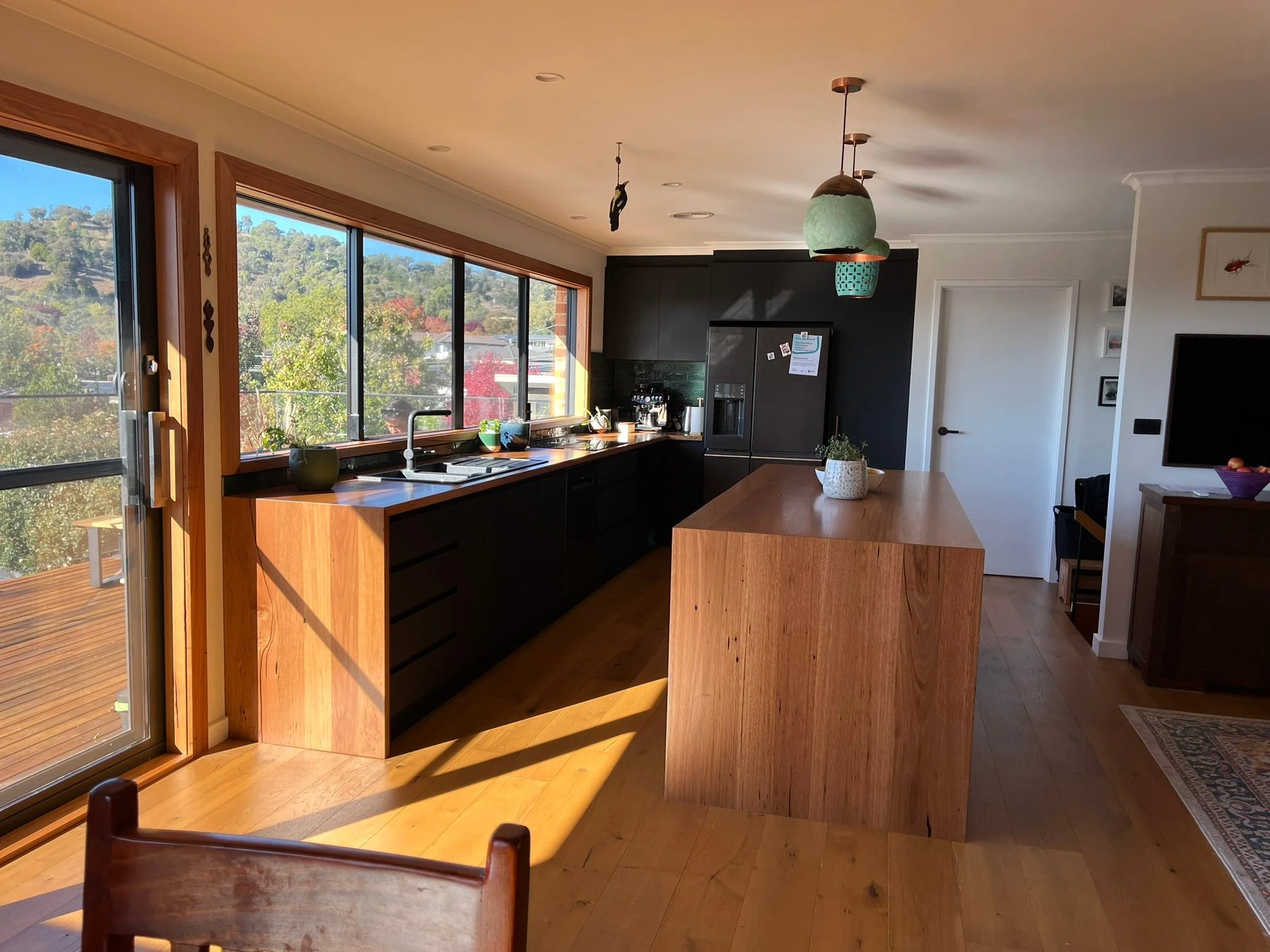 A Home Connected by Recycled Timber