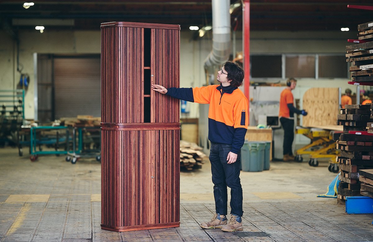 Tambour cocktail cabinet in mixed reds