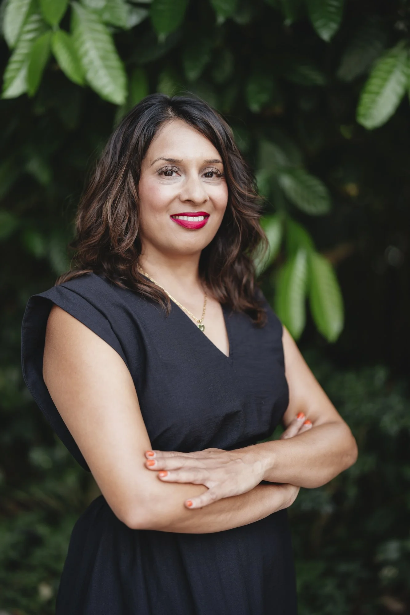 Image of Tina Padia wearing a black dress