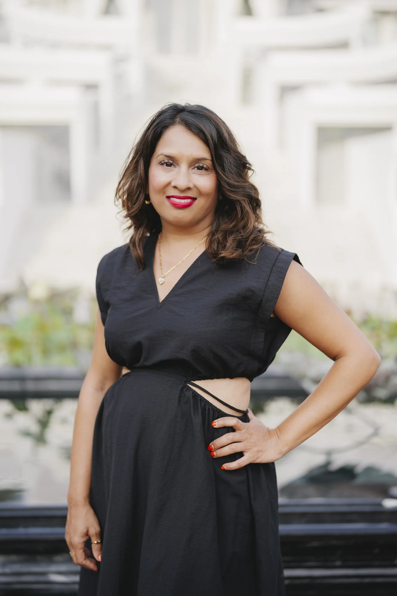 Tina wearing a black dress