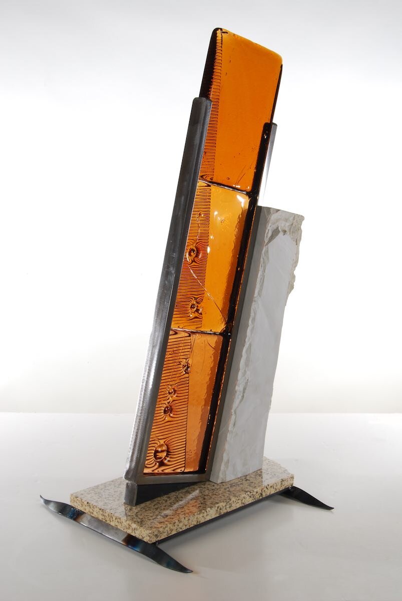    Tectonic Shift II  , 30” x 17” x 14”, glass / steel / limestone / granite 