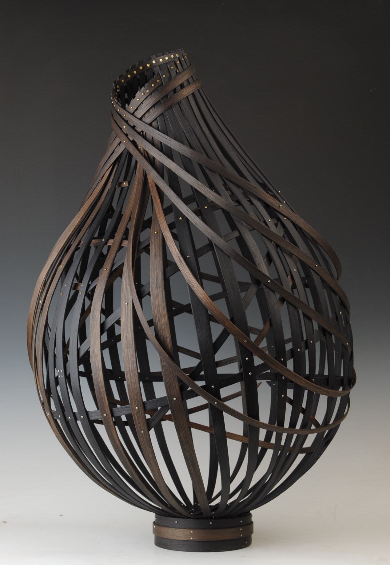    Bentwood Sculptural Basket  , white oak dardened with iron and walnut hulls, mini machine screws, 29”H x 17”D 