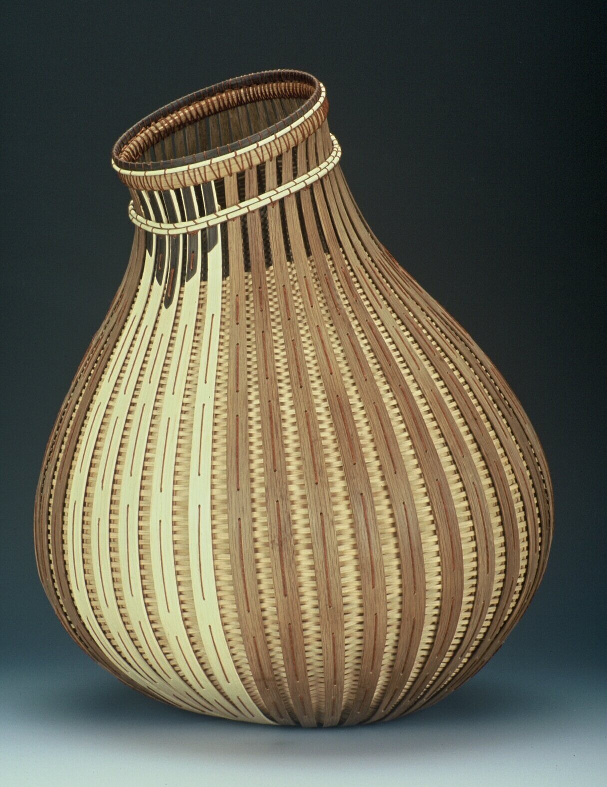    Leaning Pot with Overlay  , white oak, stitched with linen thread, 16”H x 14”D 