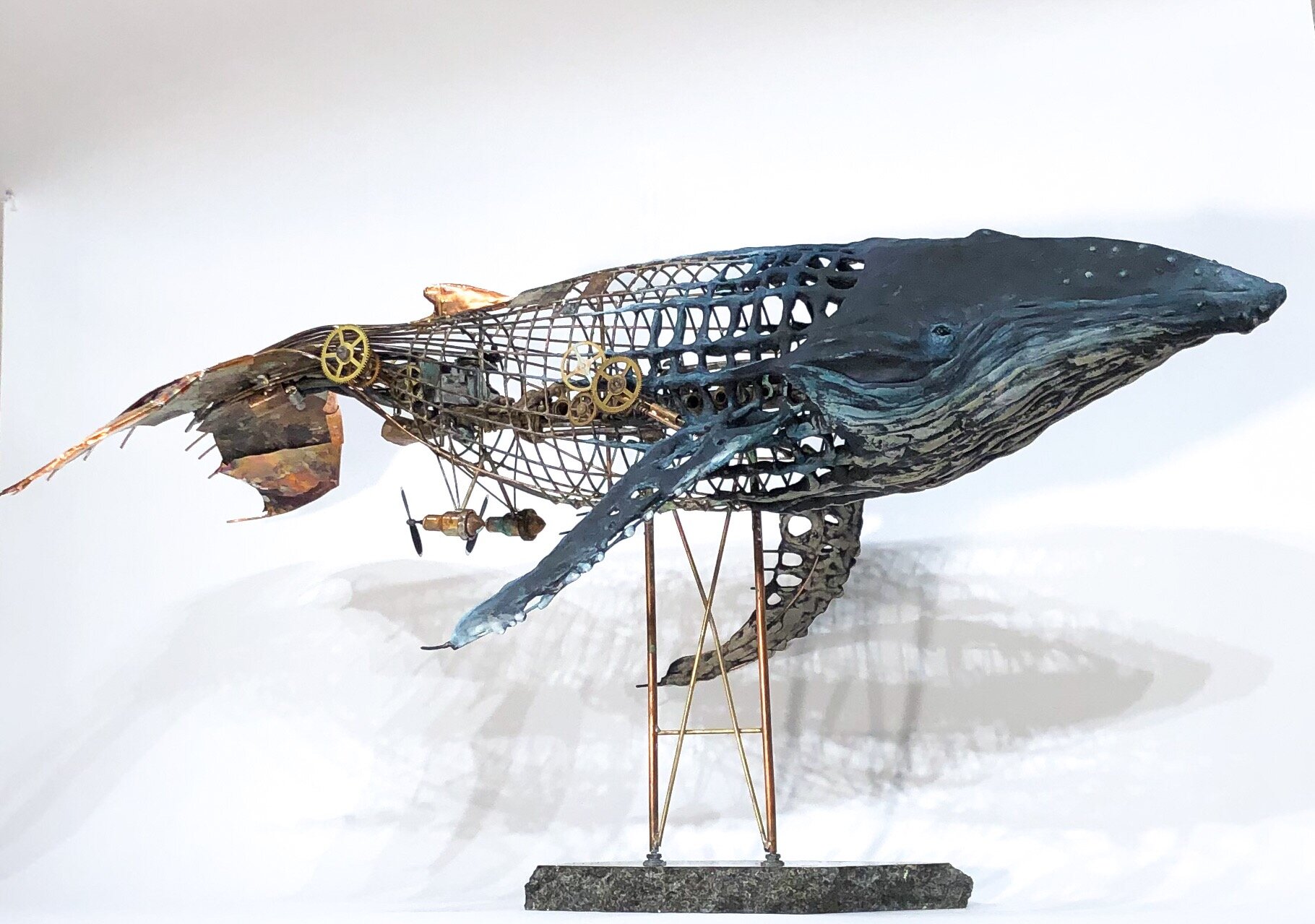    Adrift  , 30” x 6” x 18”, found objects and clay 