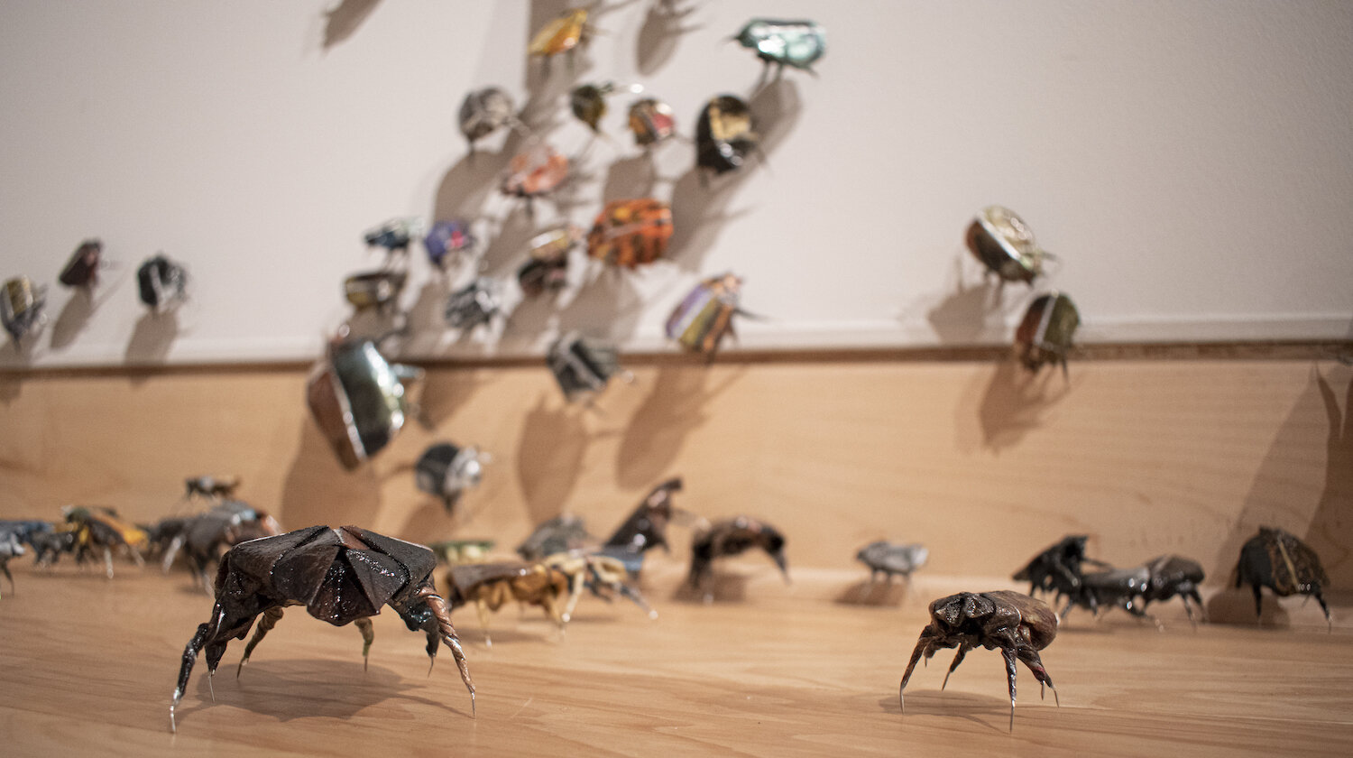    All That I Love   (detail), origami beetles made from photographs 