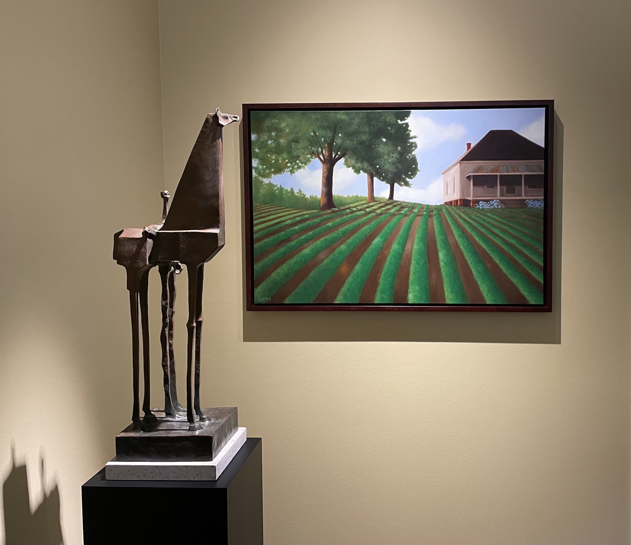    Zeke and Zach  , 28” x 9” x 8”, bronze, Wayne Salge;   Spring Planting  , 24” x 36”, oil on canvas, Sheila Cotton 