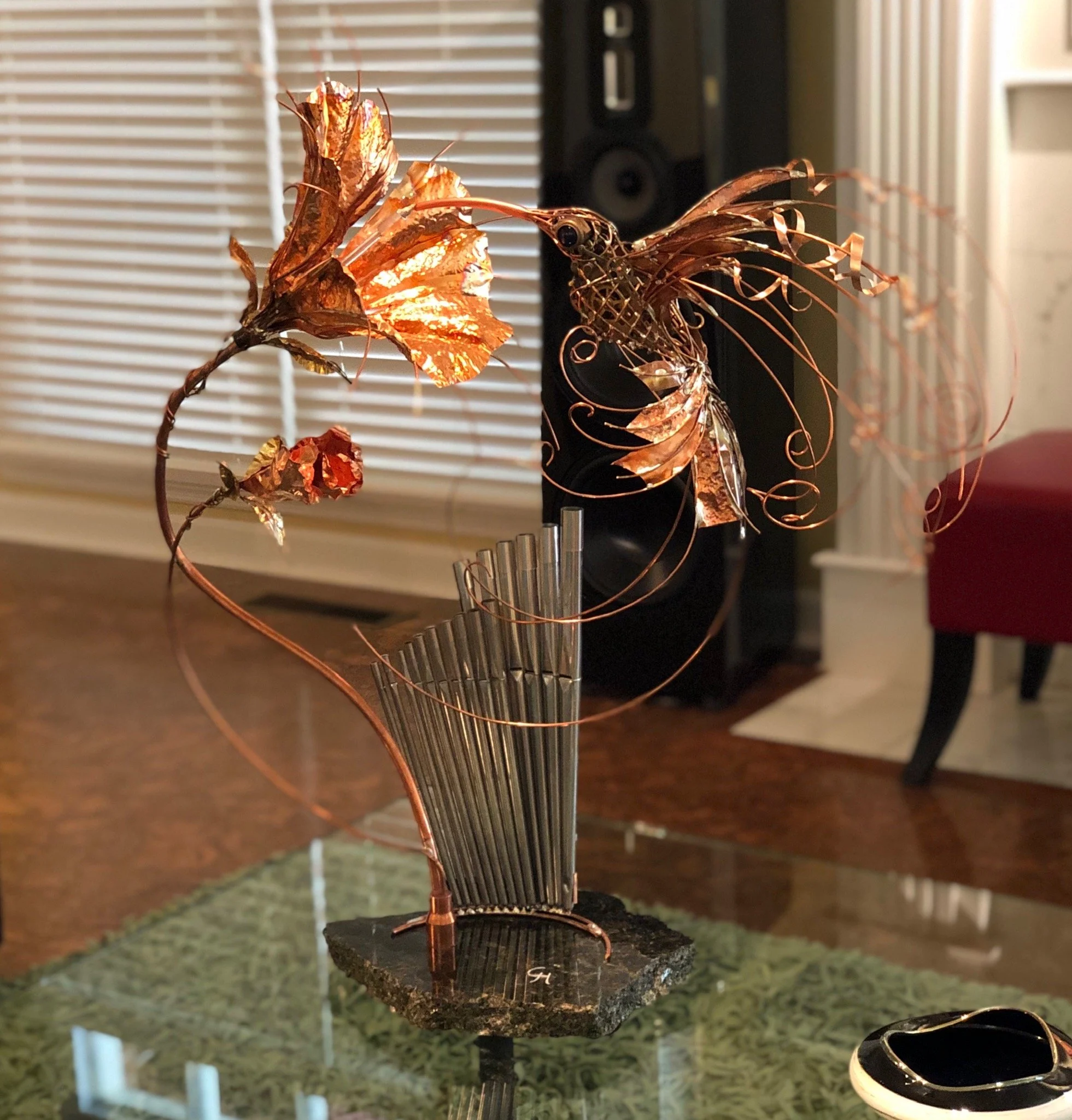    Hummingbird in the Garden of Pan  , 27” x 10” x 28”, found objects and organ pipes,  Chris Hynes  