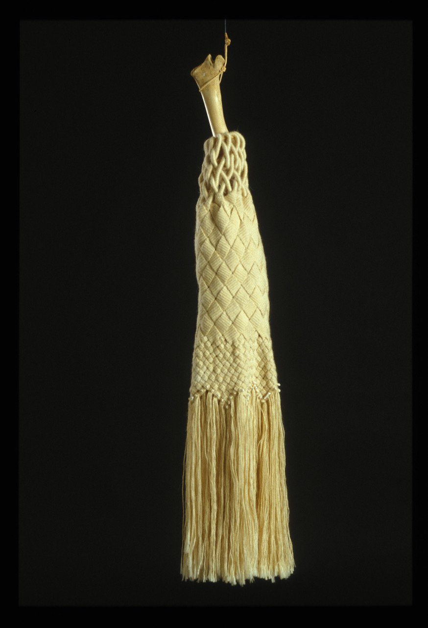    Dance Wand #4  , 8”d x 53”h, card weaving, plaiting, coiling English mohair, bone, shells 