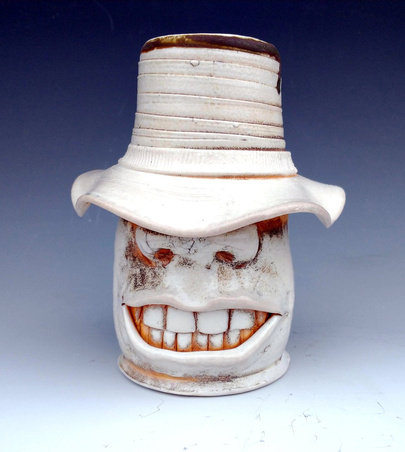    Bucket-hat Face Mug  , 8” x 3” x 3”, wood-fired porcelain 