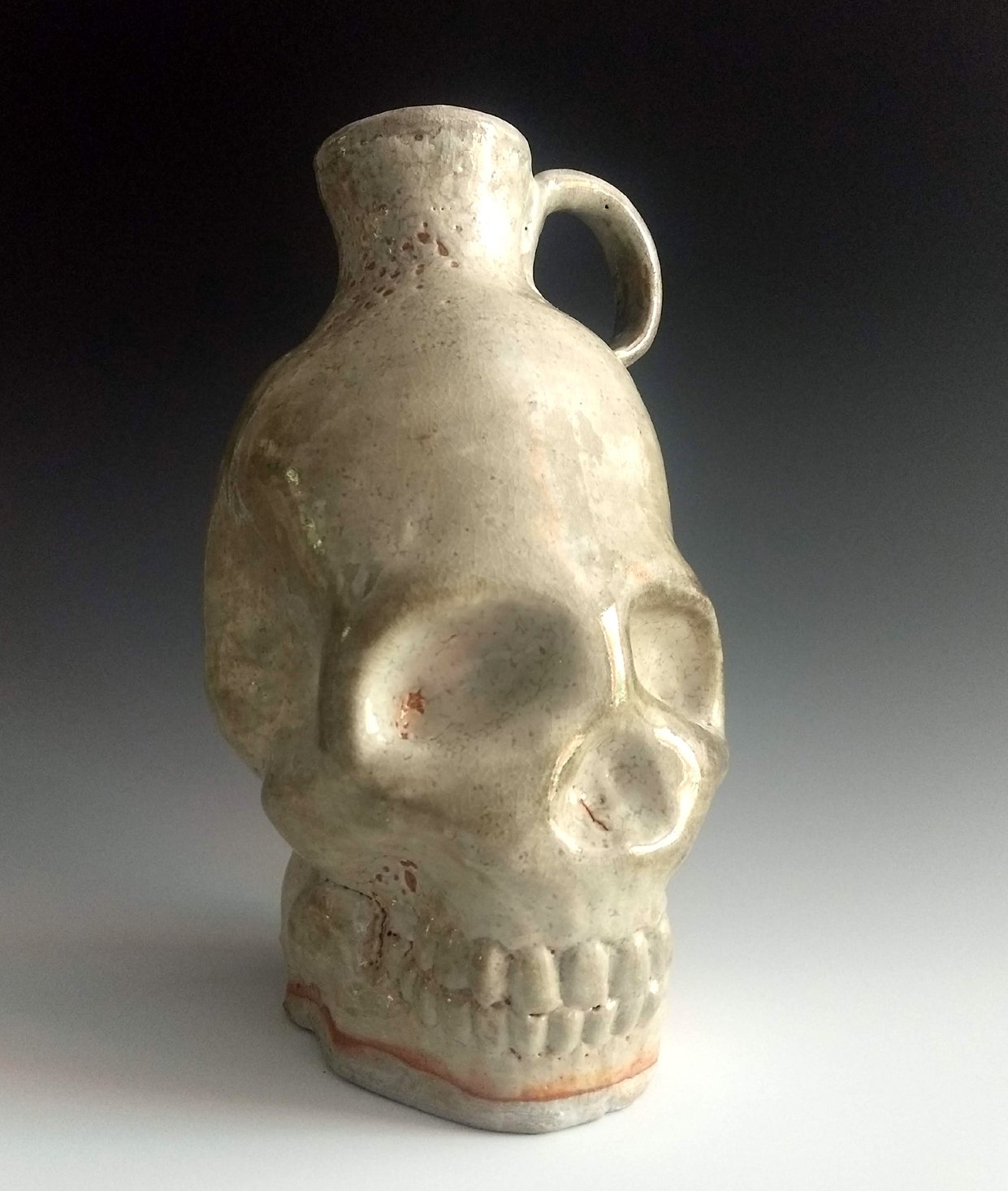    Skull Jug  , 10” x 5” x 5”, soda-fired ceramic 