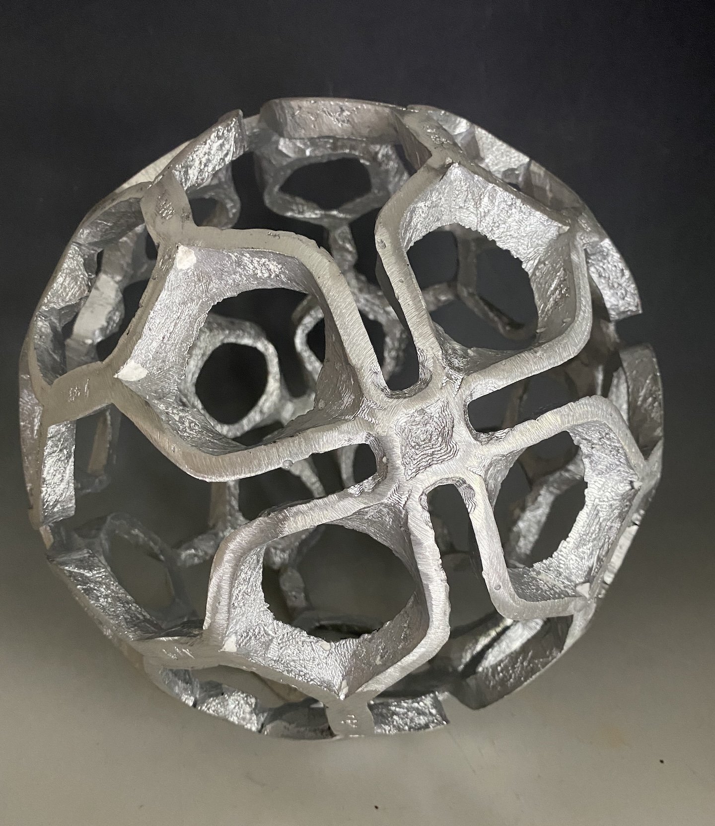    Untitled  , 12” diameter, aluminum 