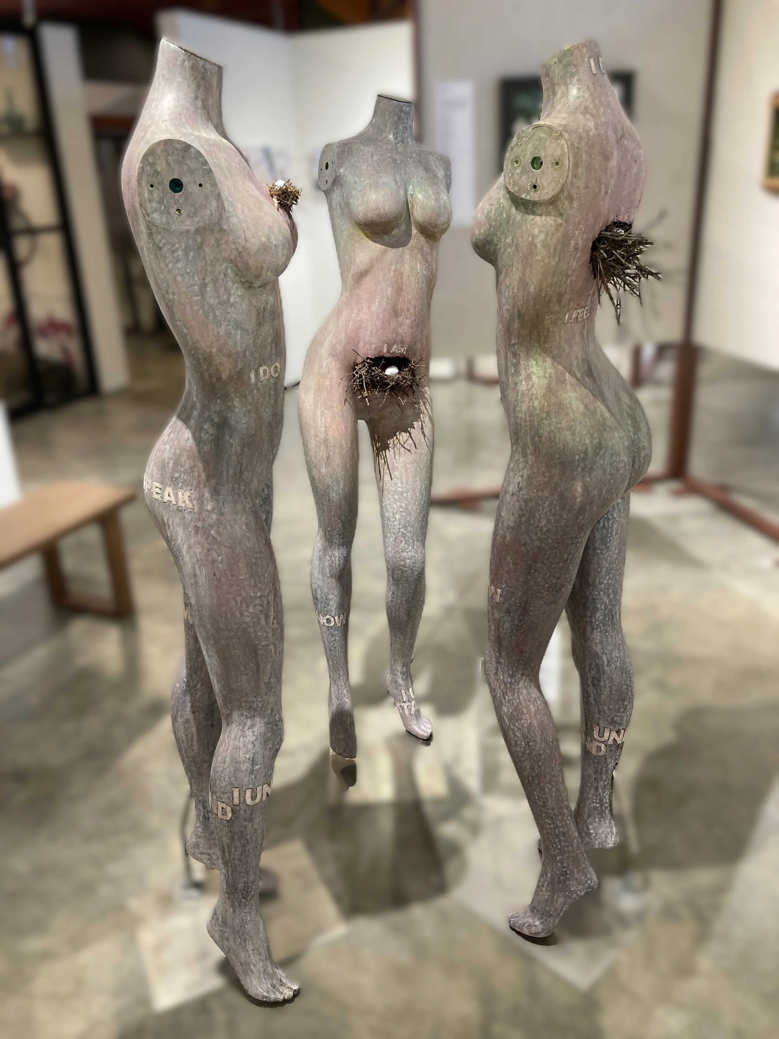    Centers of Power: Betrayal/Compassion, Breaking/Growth, Death/Life  , acrylic, bird nest, wax, paper on fiberglass mannequins, 66” x 19” x 10” each 