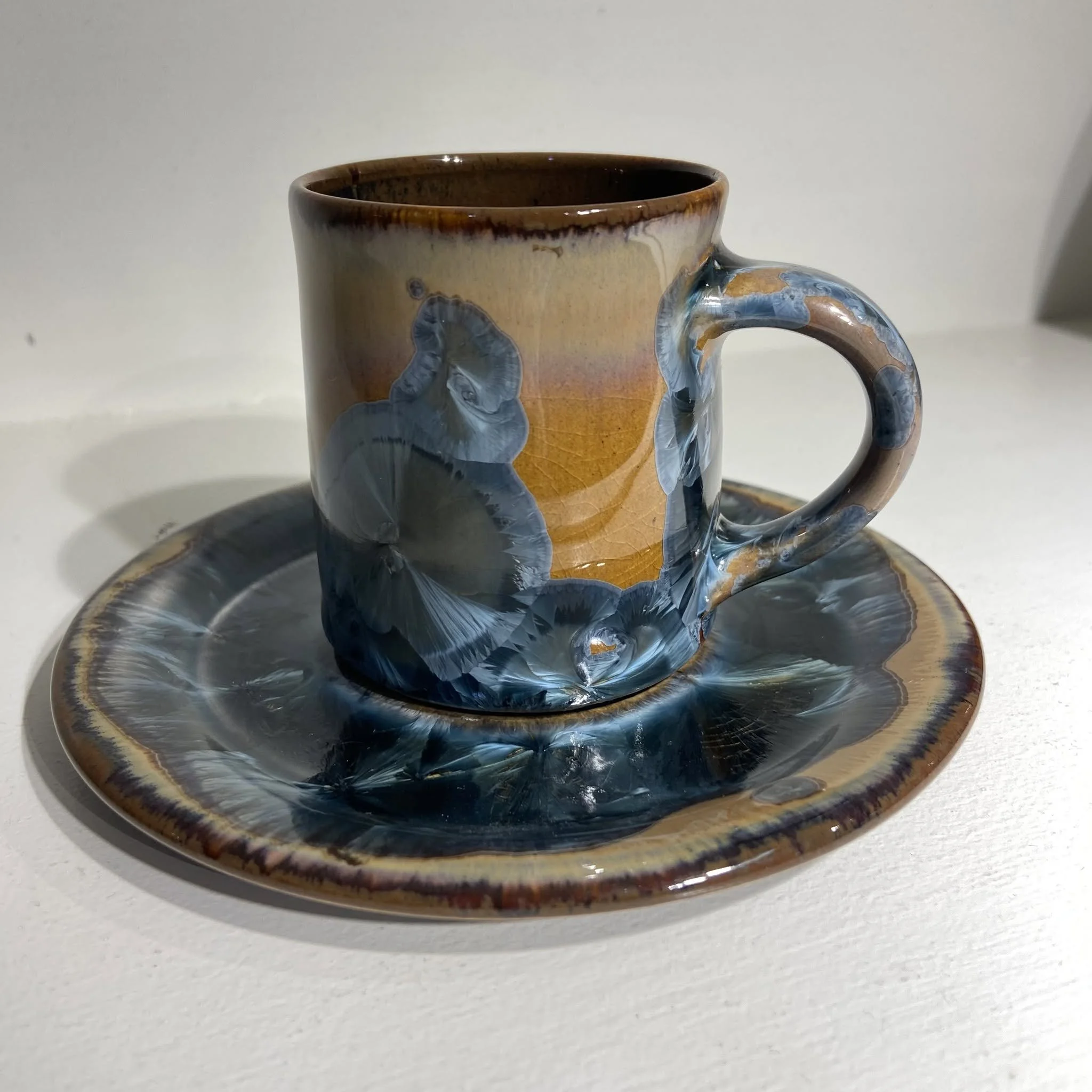    Aegean Rust Cup and Saucer  , porcelain 
