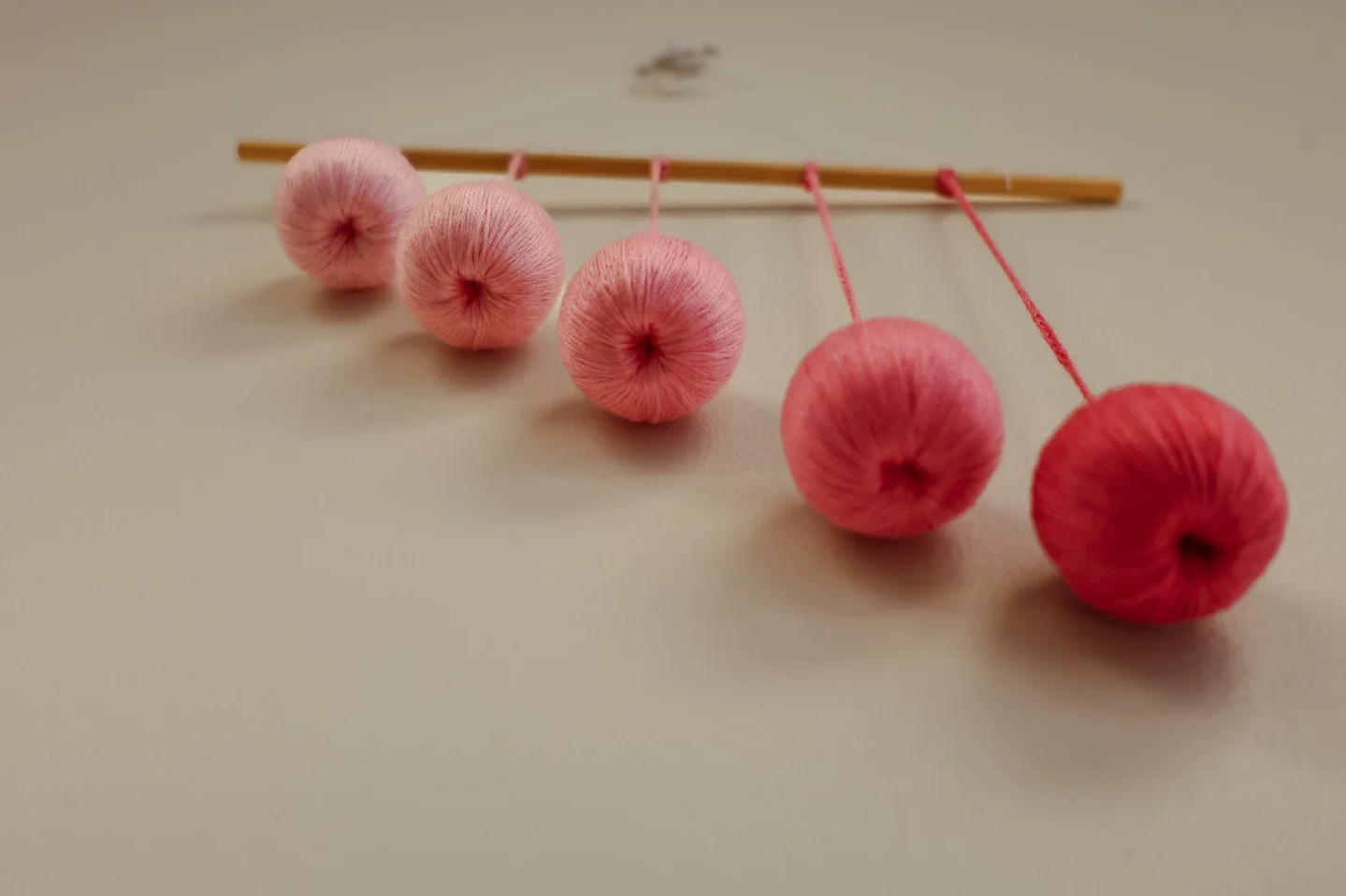 Let us show you something! A beautiful Montessori materials for infants is the Gobbi Mobile, one of the progression of mobiles to support Visual Development in the first months of life. This is one we have here at MINT. 

Introduced around 3 months o