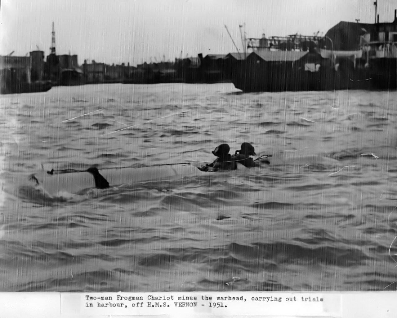 Chariot two-man human torpedo in Portsmouth harbour off HMS VERNON