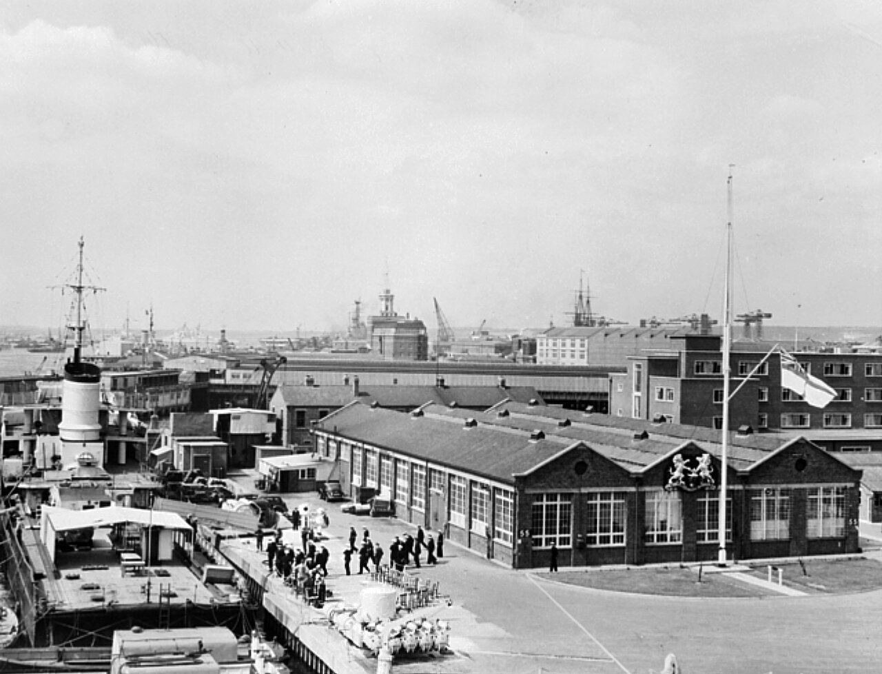 The floating diving school Deepwater alongside Maintenance Jetty at HMS VERNON in the 1950s