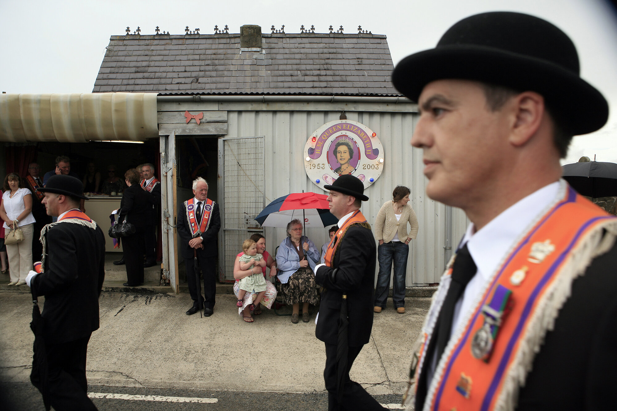 Orange men march outside Drumcree Parish Church, Portadown, 2009. Their yearly parade which at one point was attended by 50,000 supporters was stopped from travelling along the Nationalist Garvaghy Road in 1999.